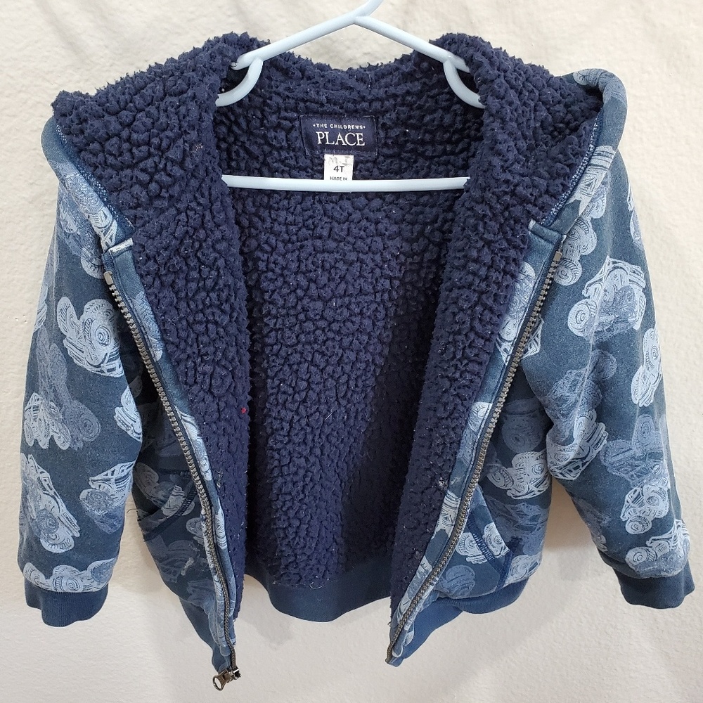 Zip up hoodie with monster truck print